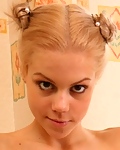 Amazing Cindy In White Dancing In The Chair While Removing Her Clothes Revealing Her Assets